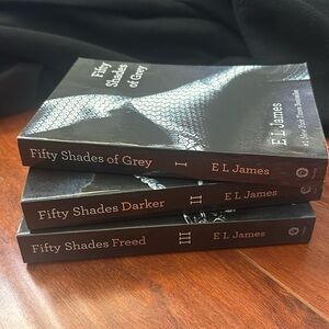 Fifty Shades of Grey Trilogy by E L James.